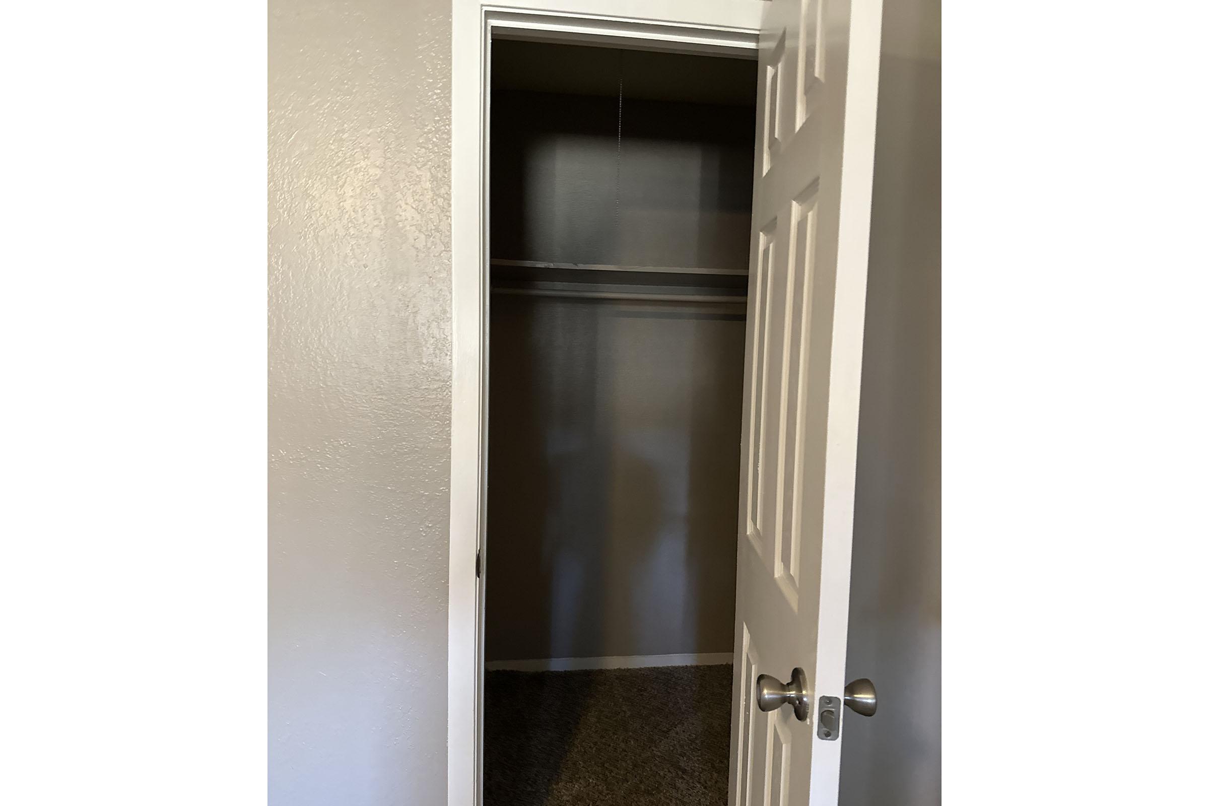 a stainless steel refrigerator with the door open