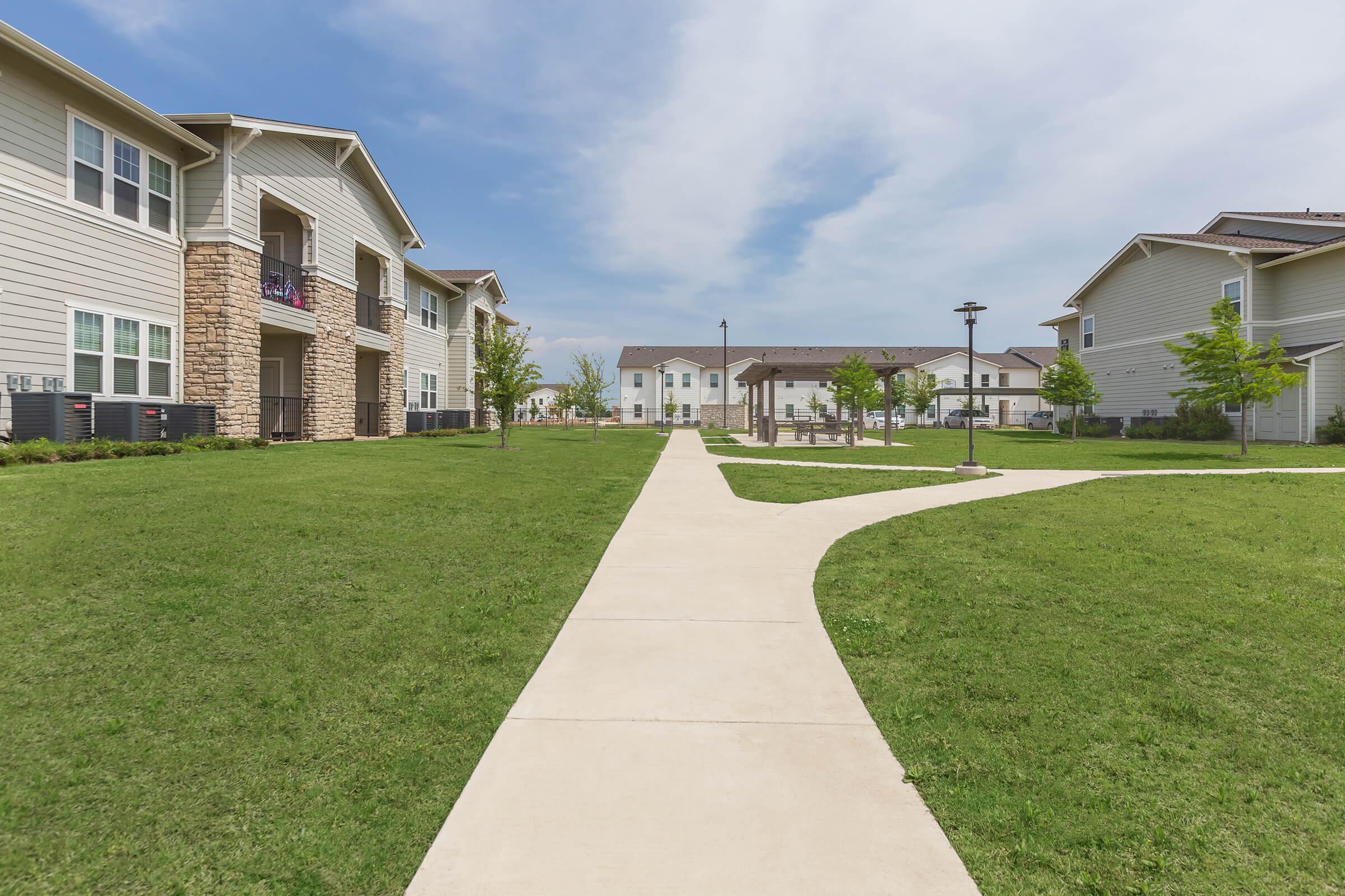 a large lawn in front of a building