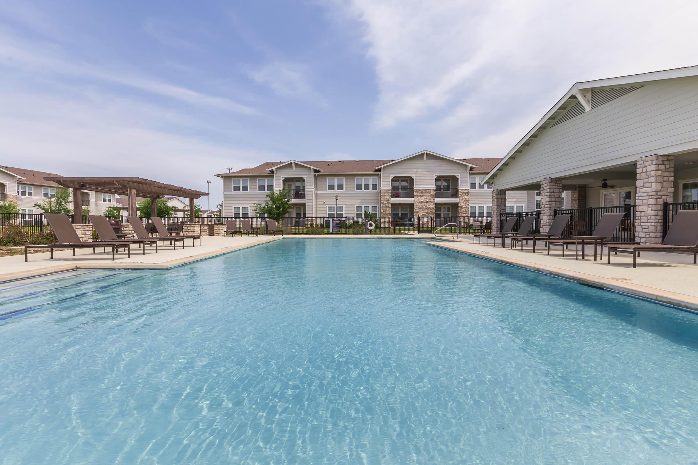 a house with a large pool of water