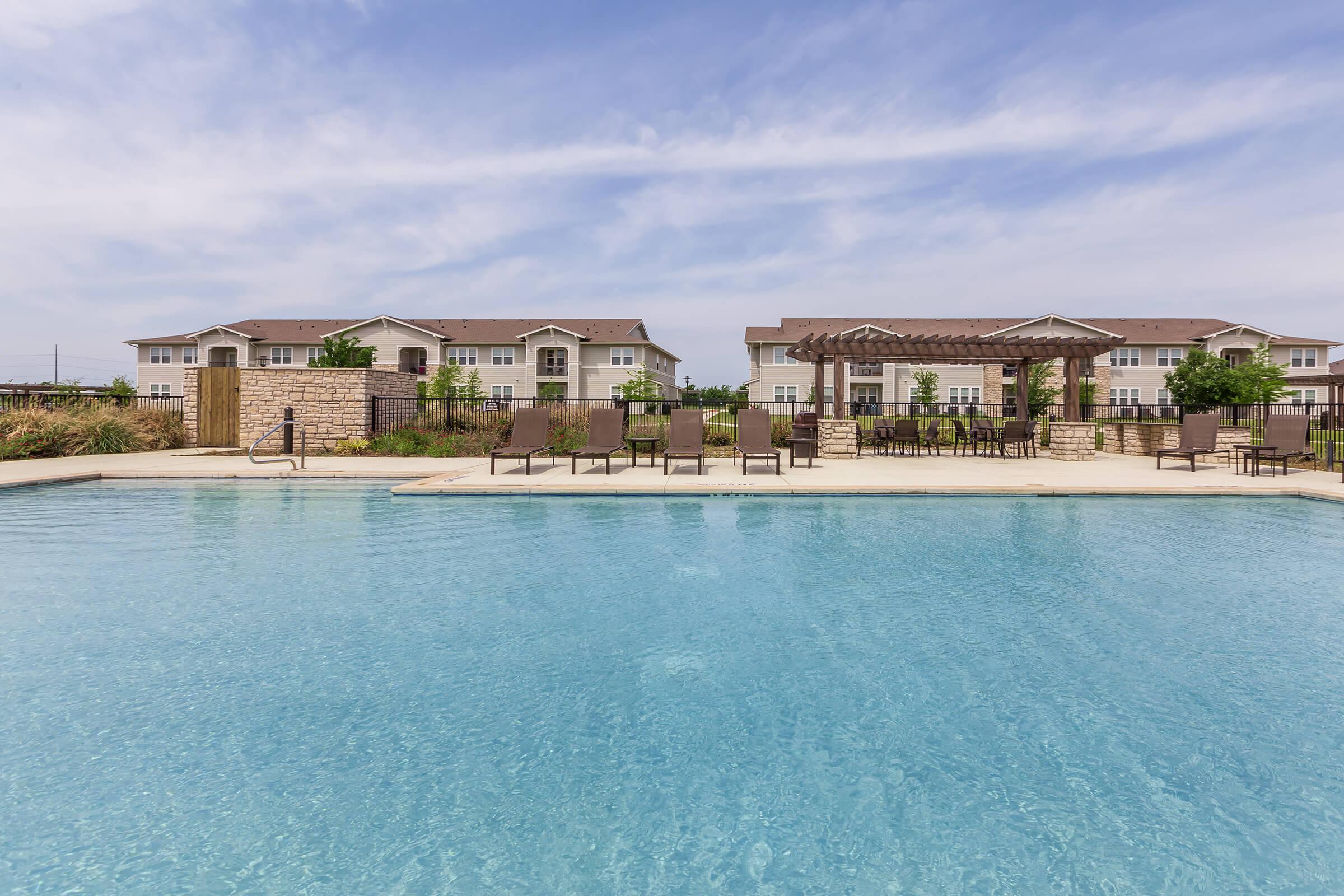 a pool next to a body of water