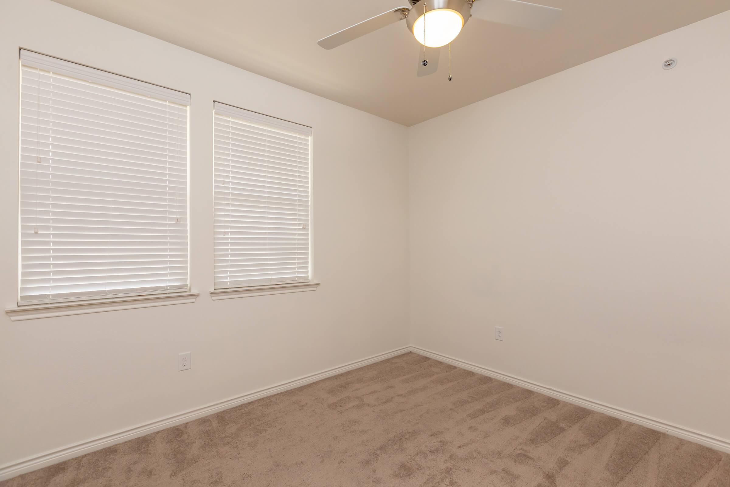 a room with a sink and a window