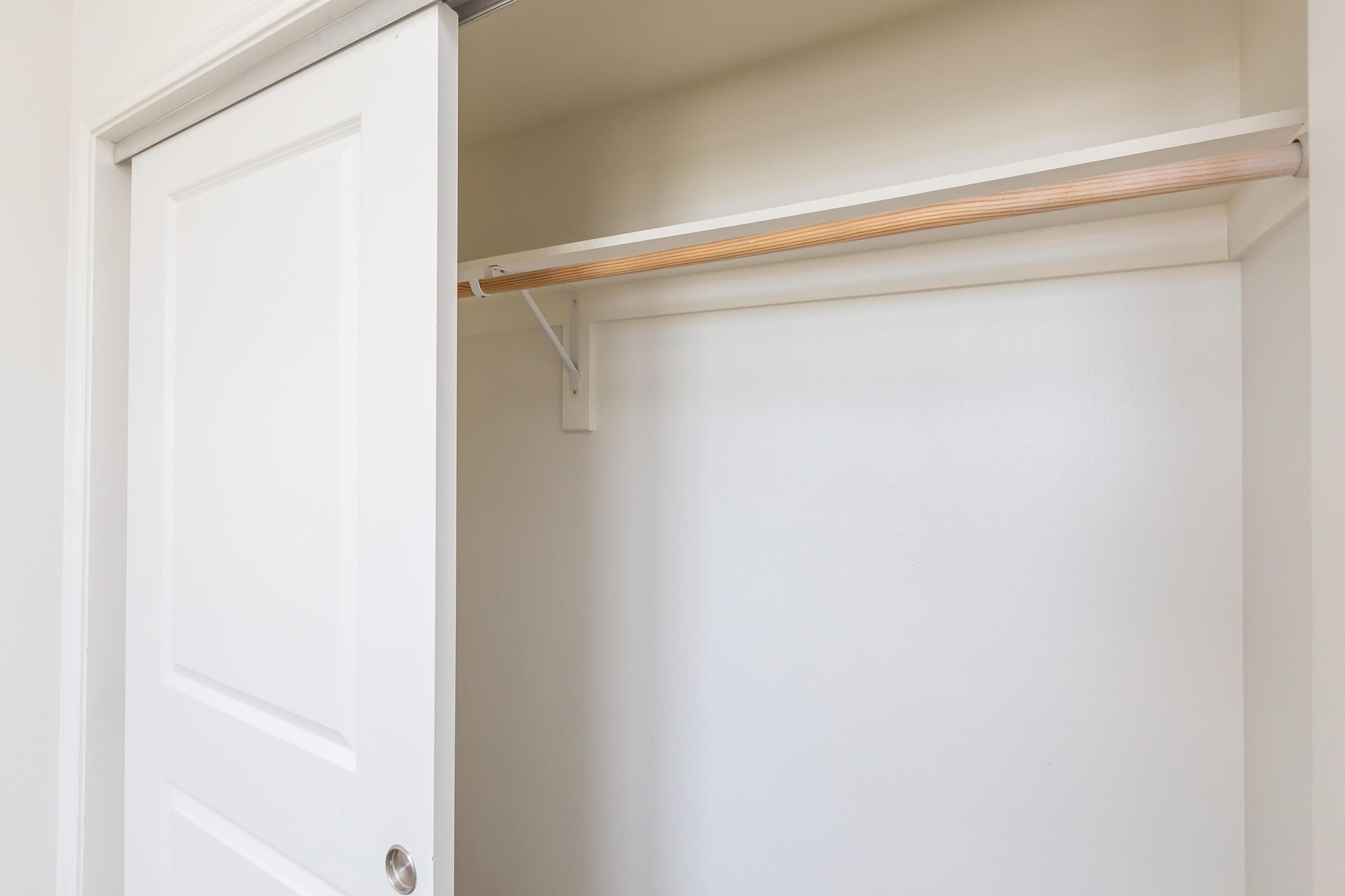 a white tub sitting next to a door