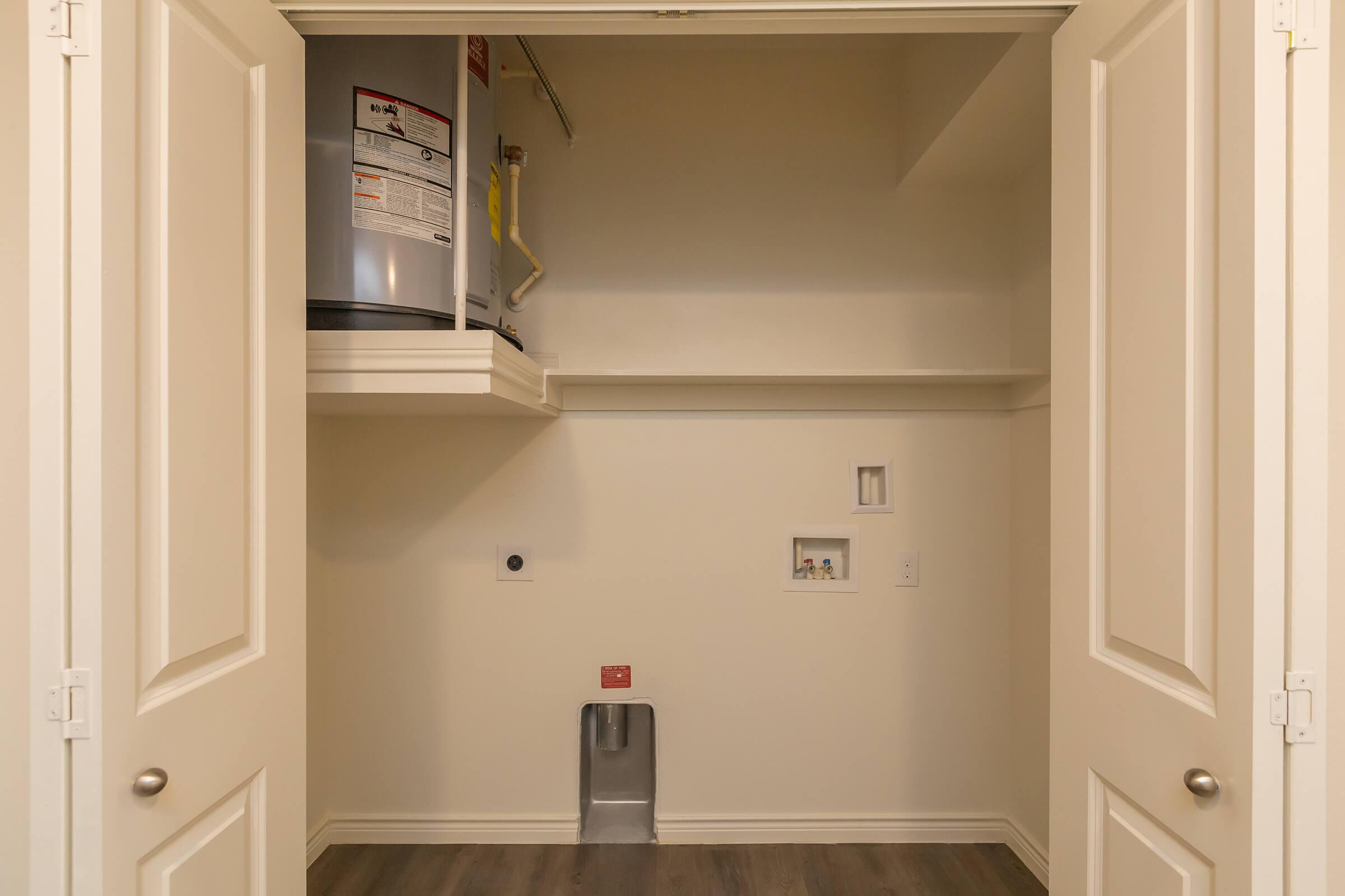 a white refrigerator freezer sitting inside of a kitchen