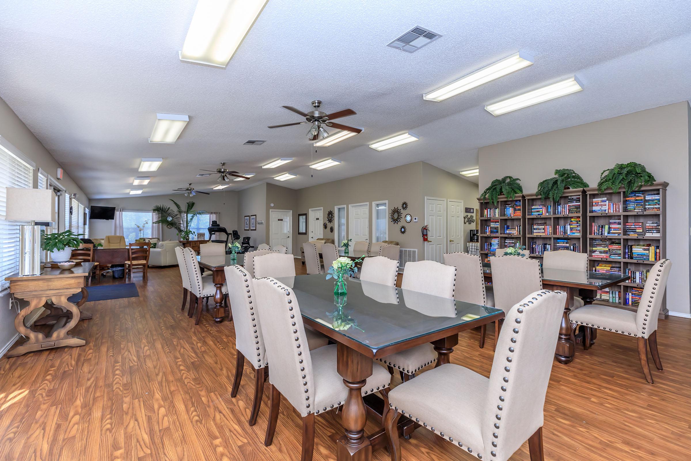 a room filled with furniture and a table