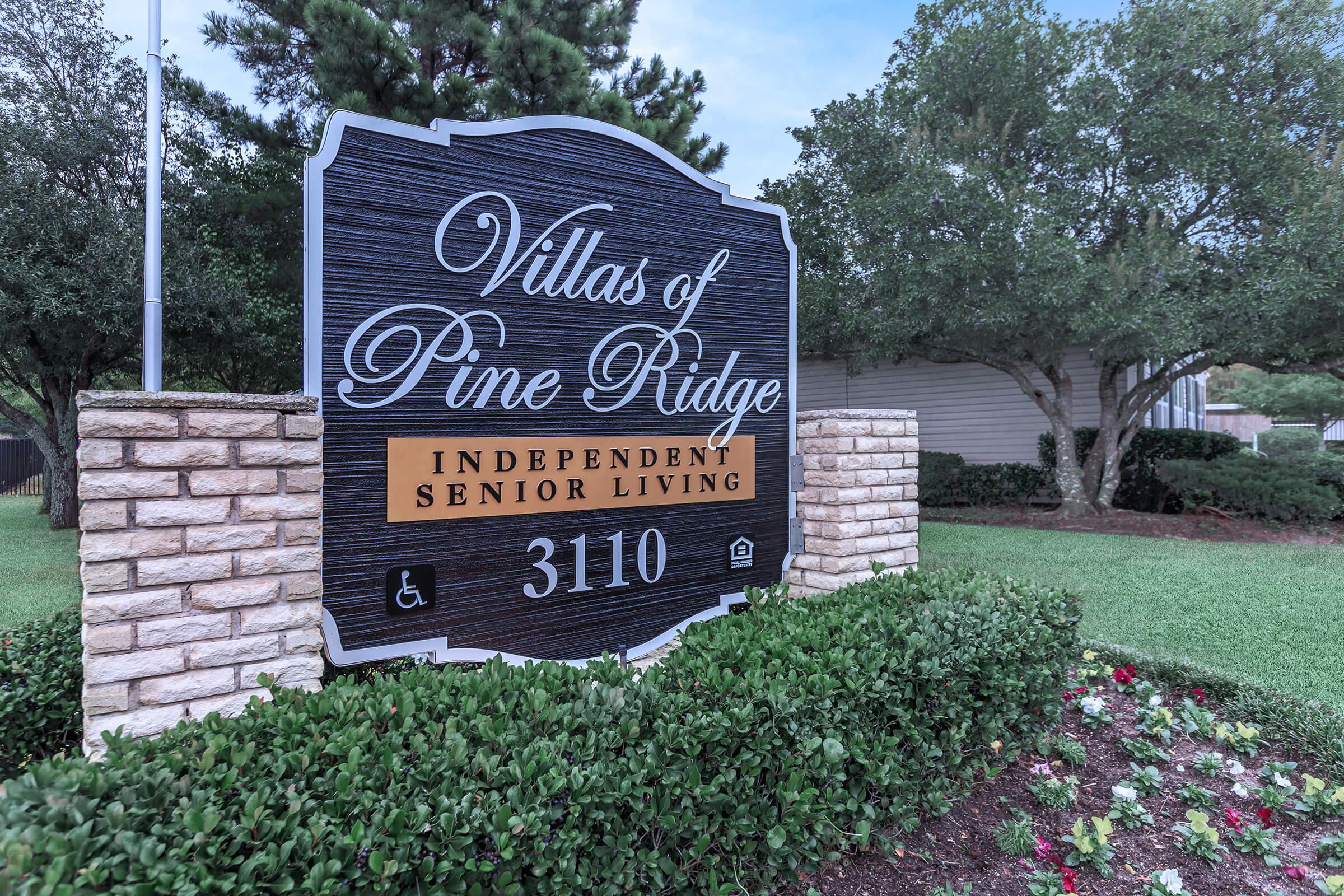 a sign in front of a house