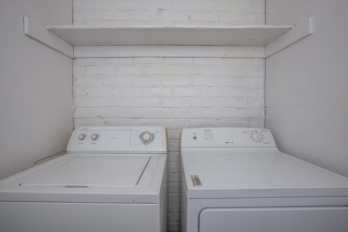 a white stove top oven sitting inside of a room