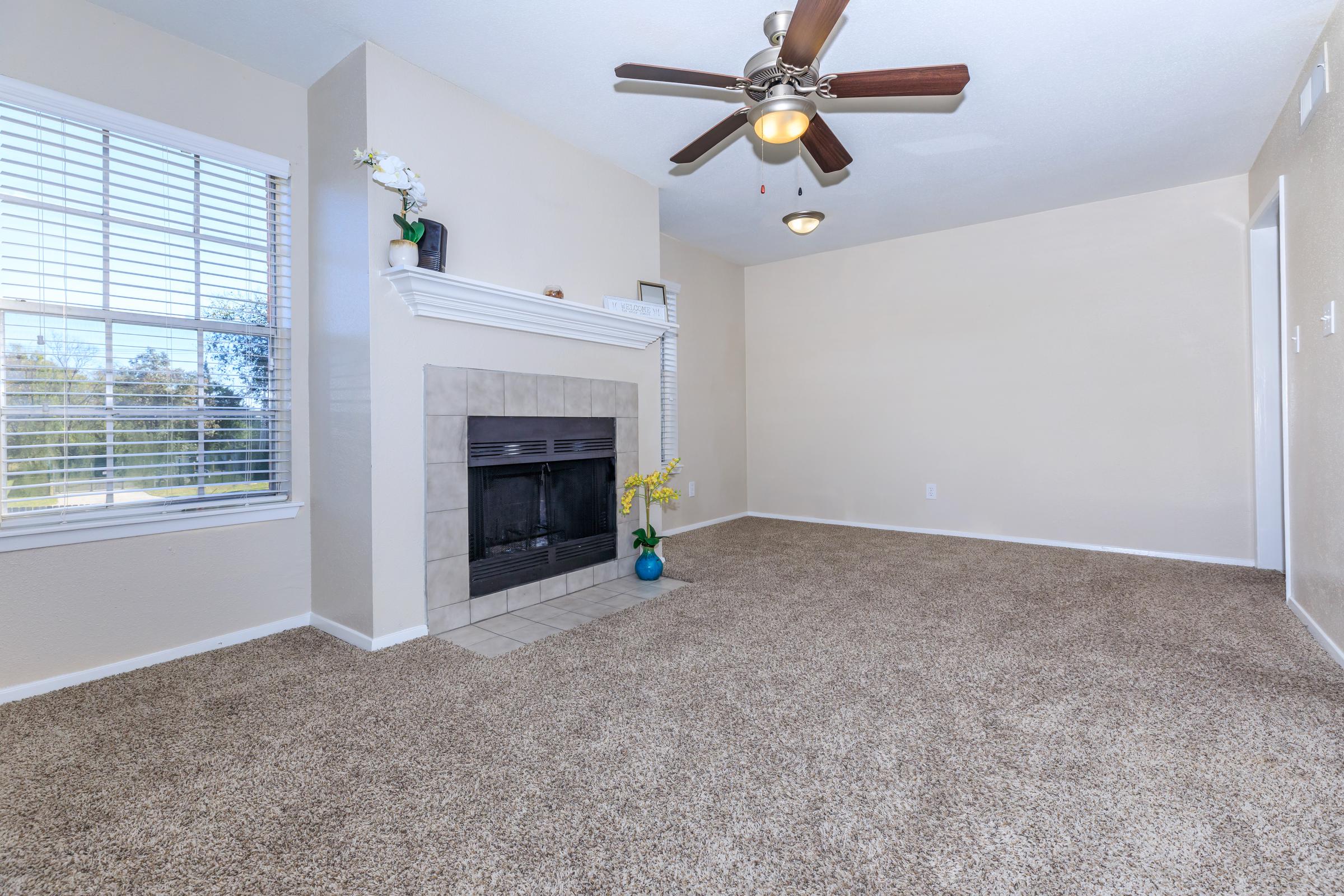 a living room next to a window