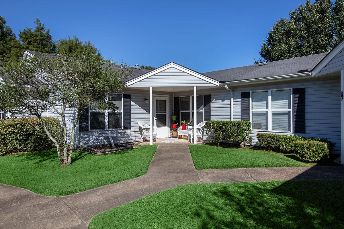 a large lawn in front of a house