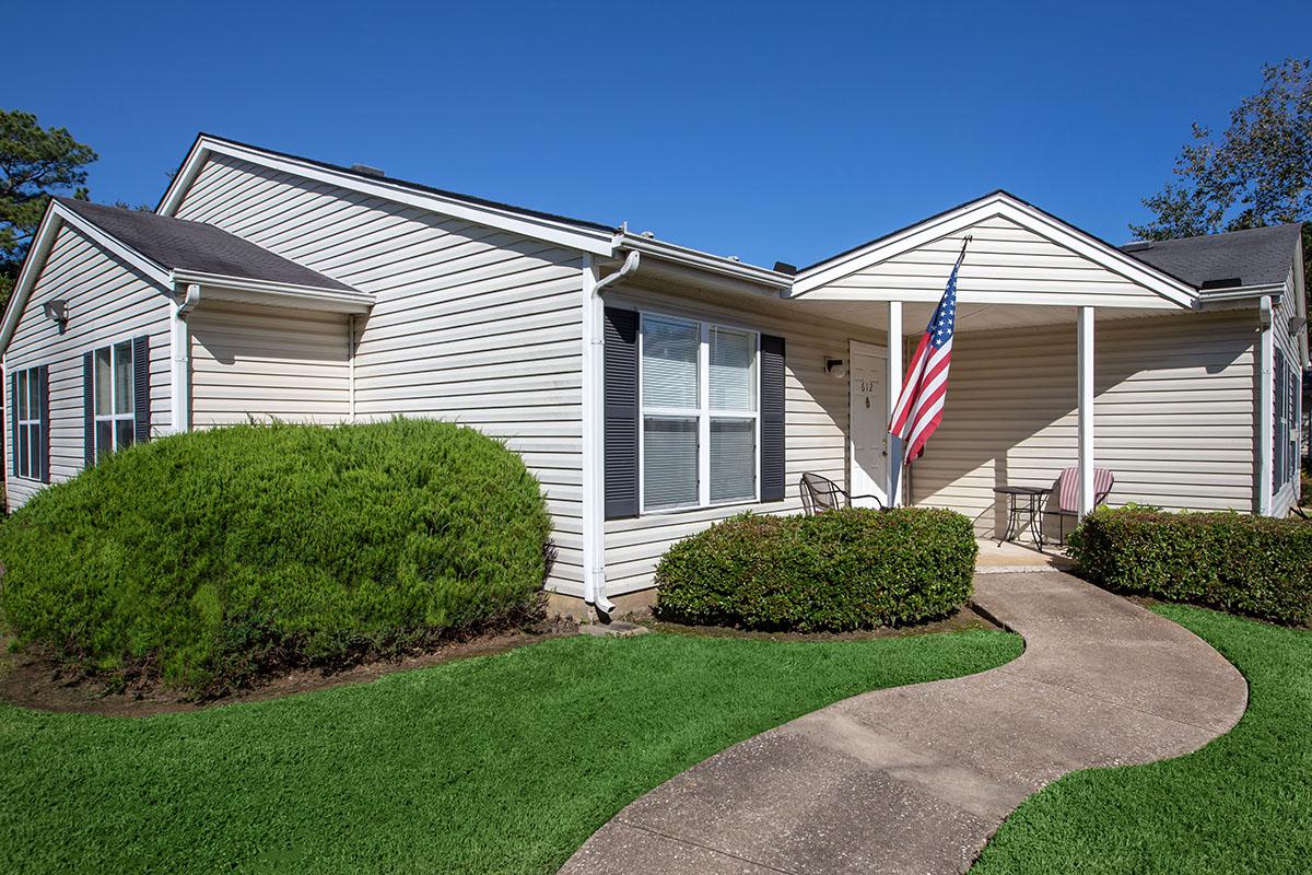 a large lawn in front of a house