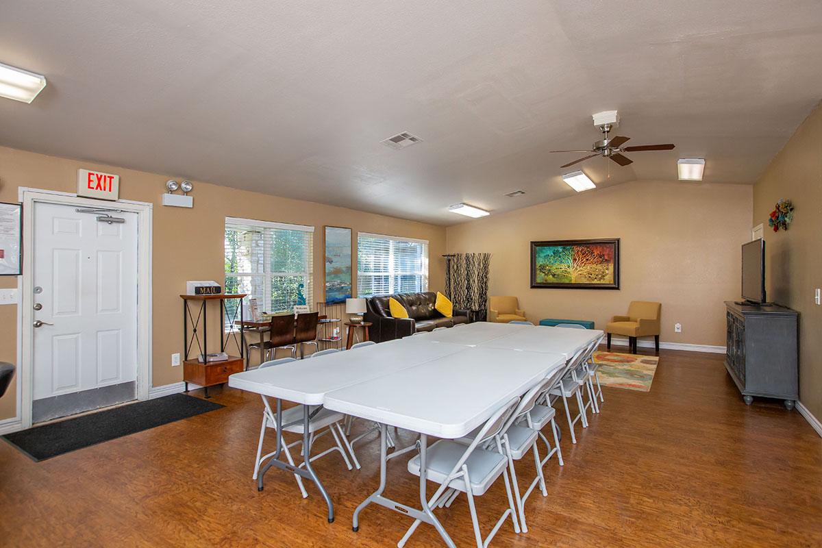 a room filled with furniture and a table