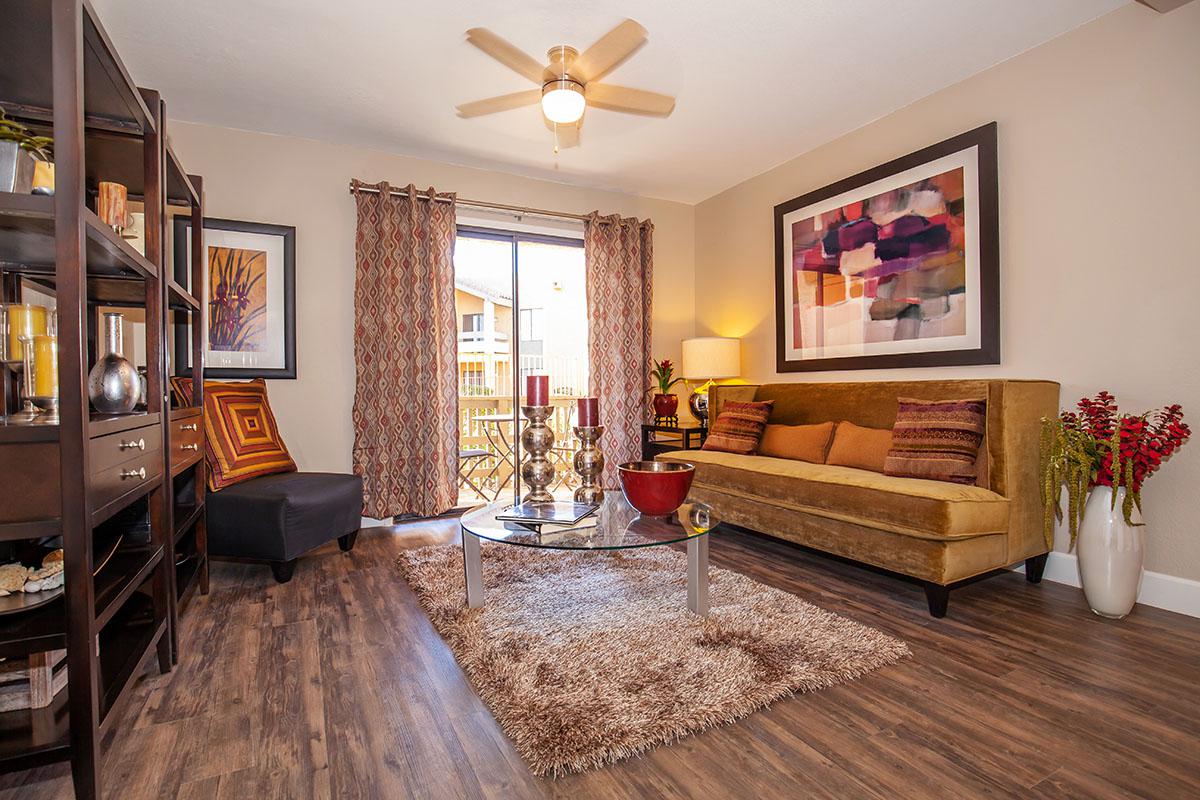 a living room filled with furniture and a fire place