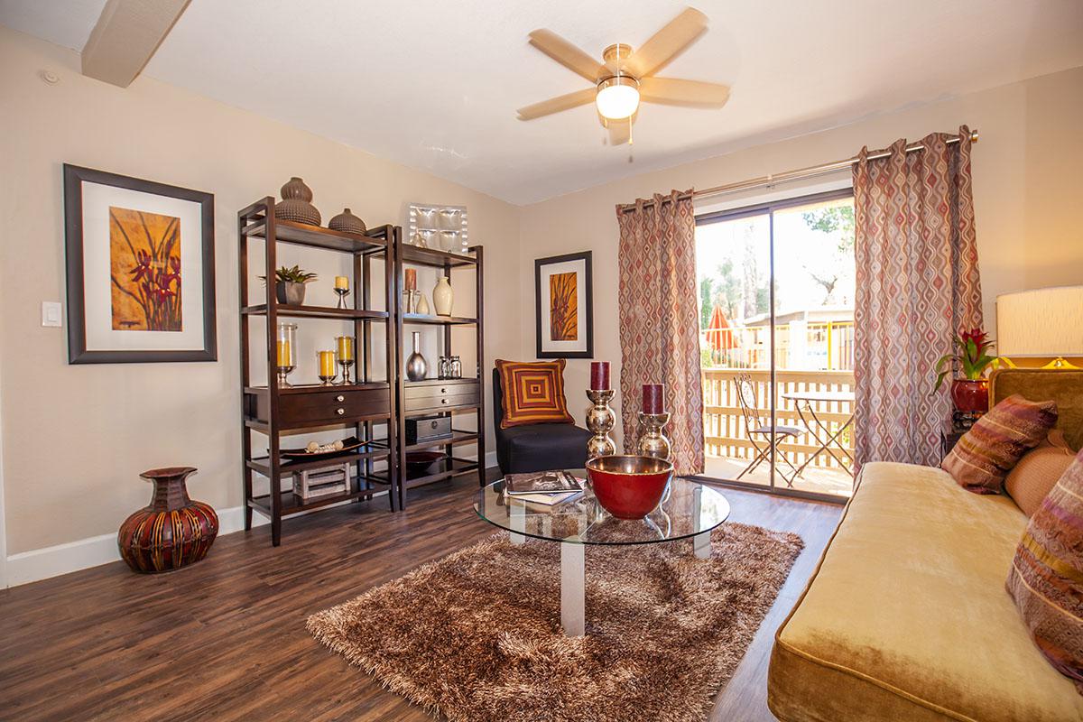 a living room filled with furniture and a fire place