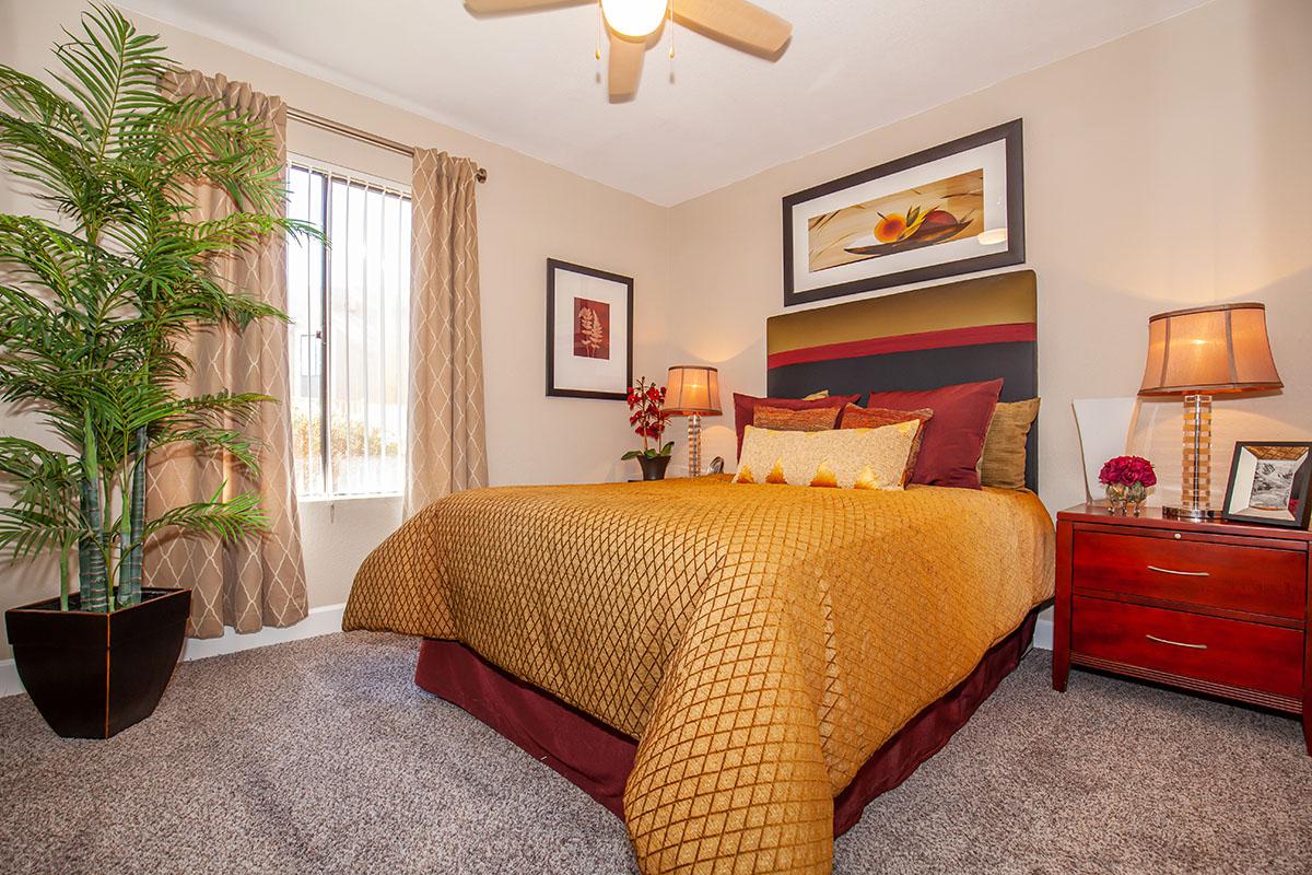 a living room with a red blanket