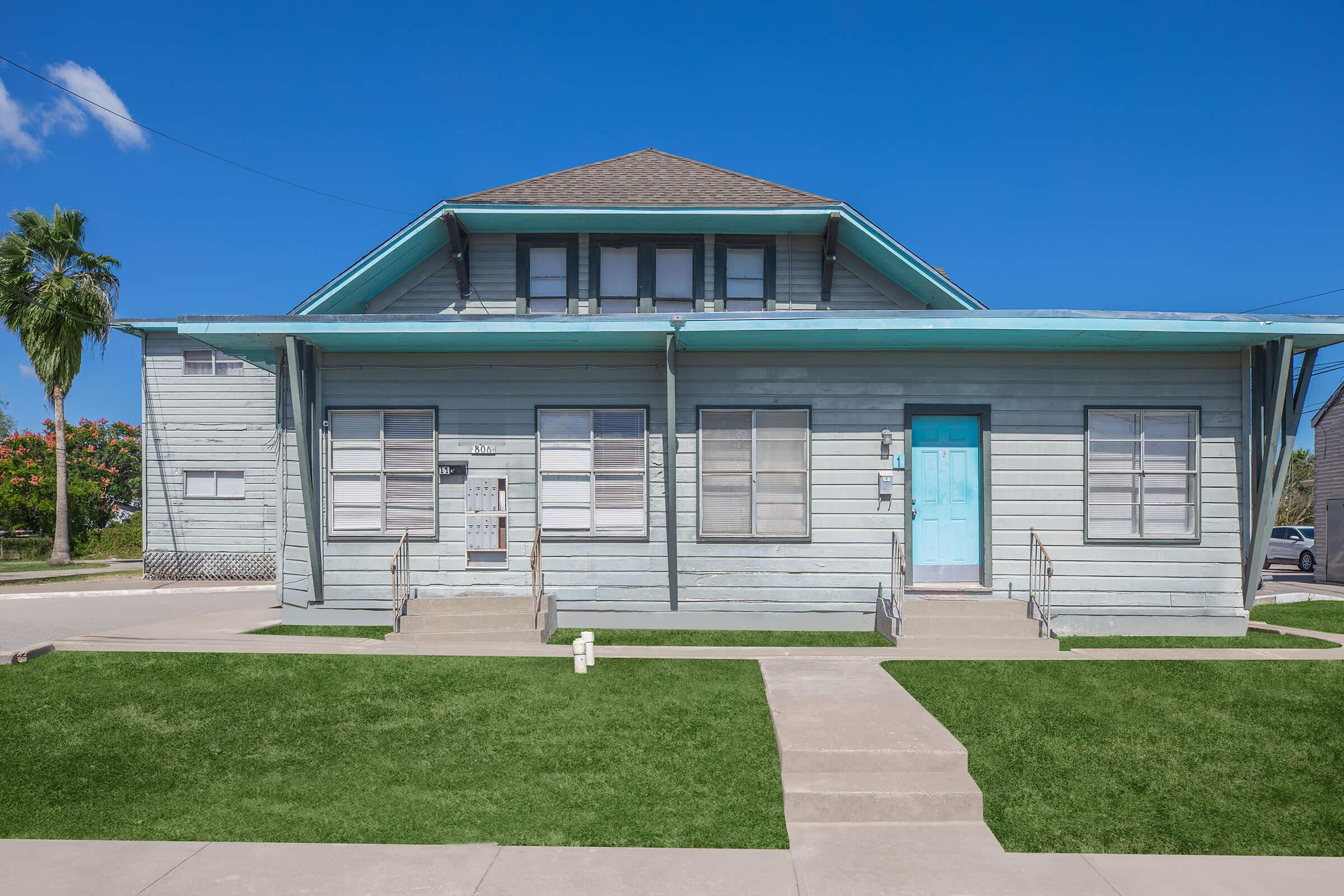 a large lawn in front of a house