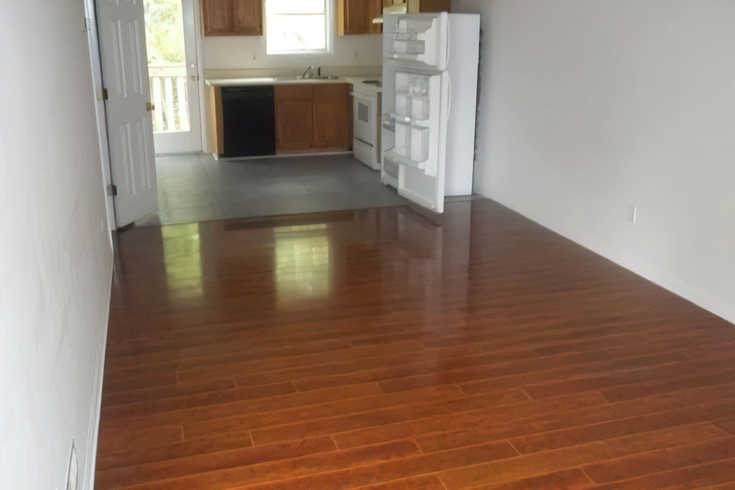 a room with a hard wood floor