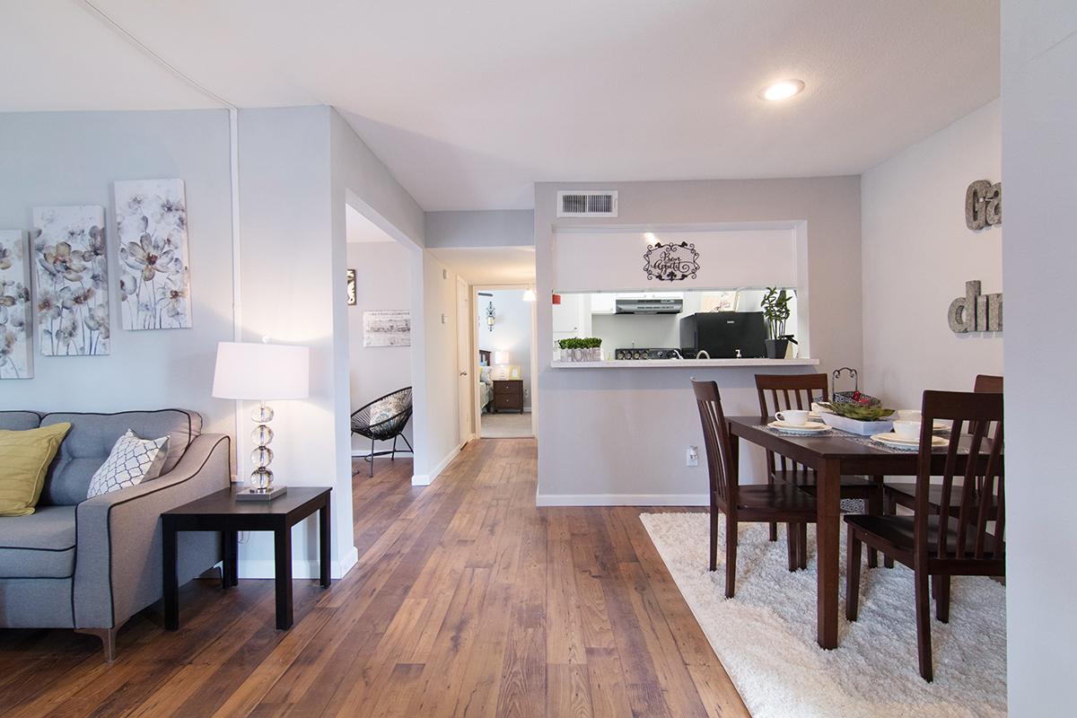 a kitchen with a dining room table