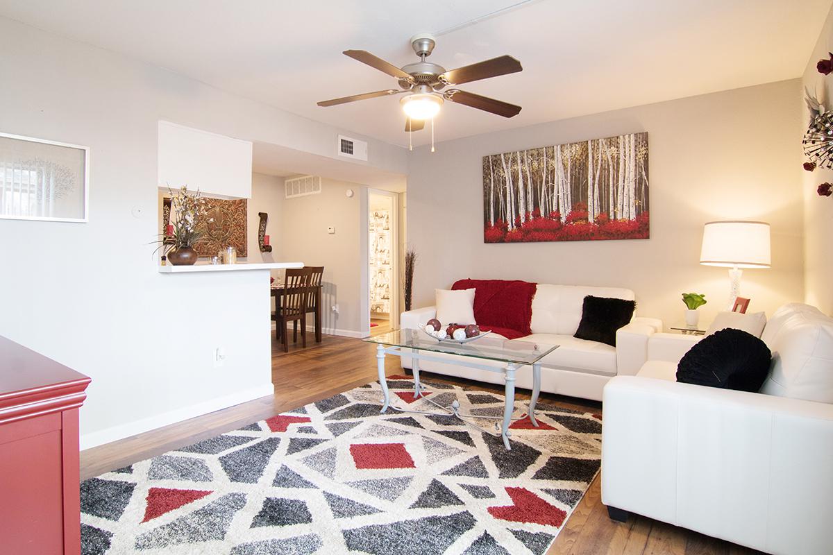 a living room filled with furniture and a fire place