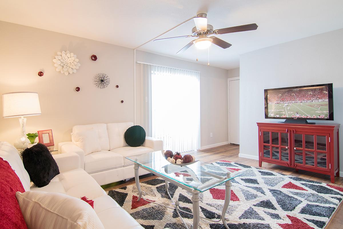 a living room with a red blanket