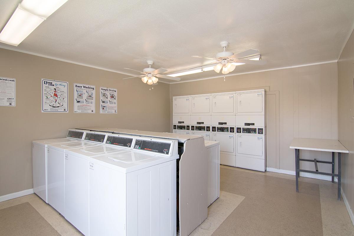 a large white refrigerator in a kitchen