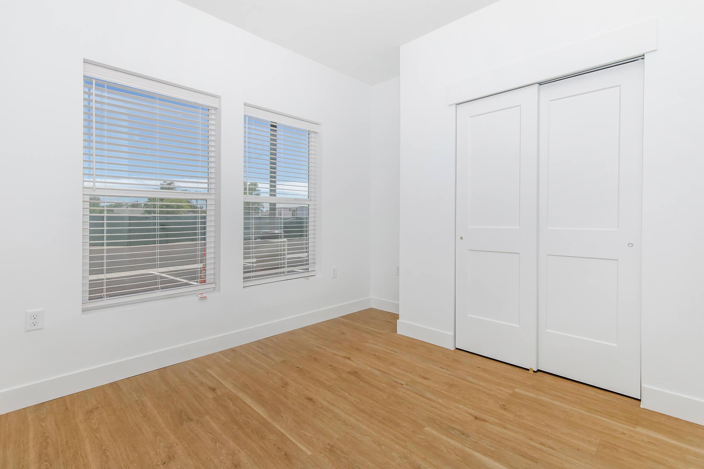 a kitchen with a large window