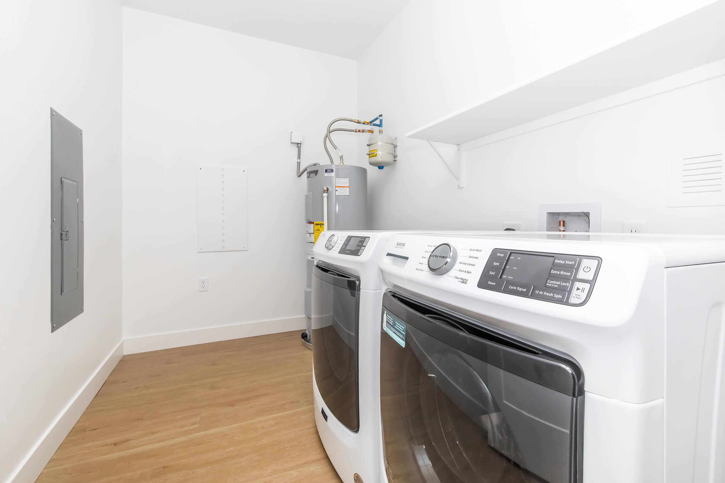 a kitchen with a stove top oven sitting inside of a refrigerator