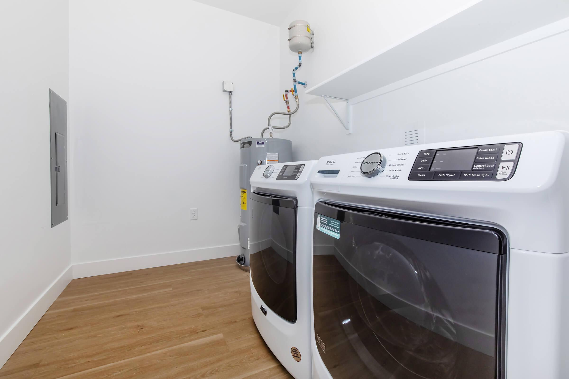 a microwave oven sitting on top of a stove