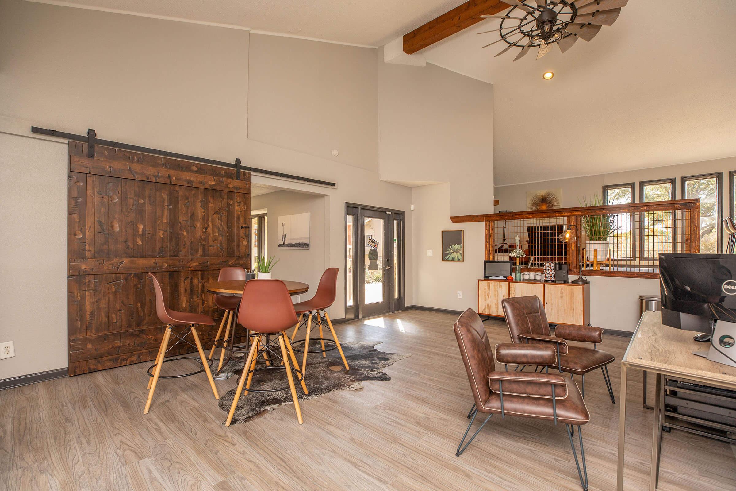 a living room with a wooden floor