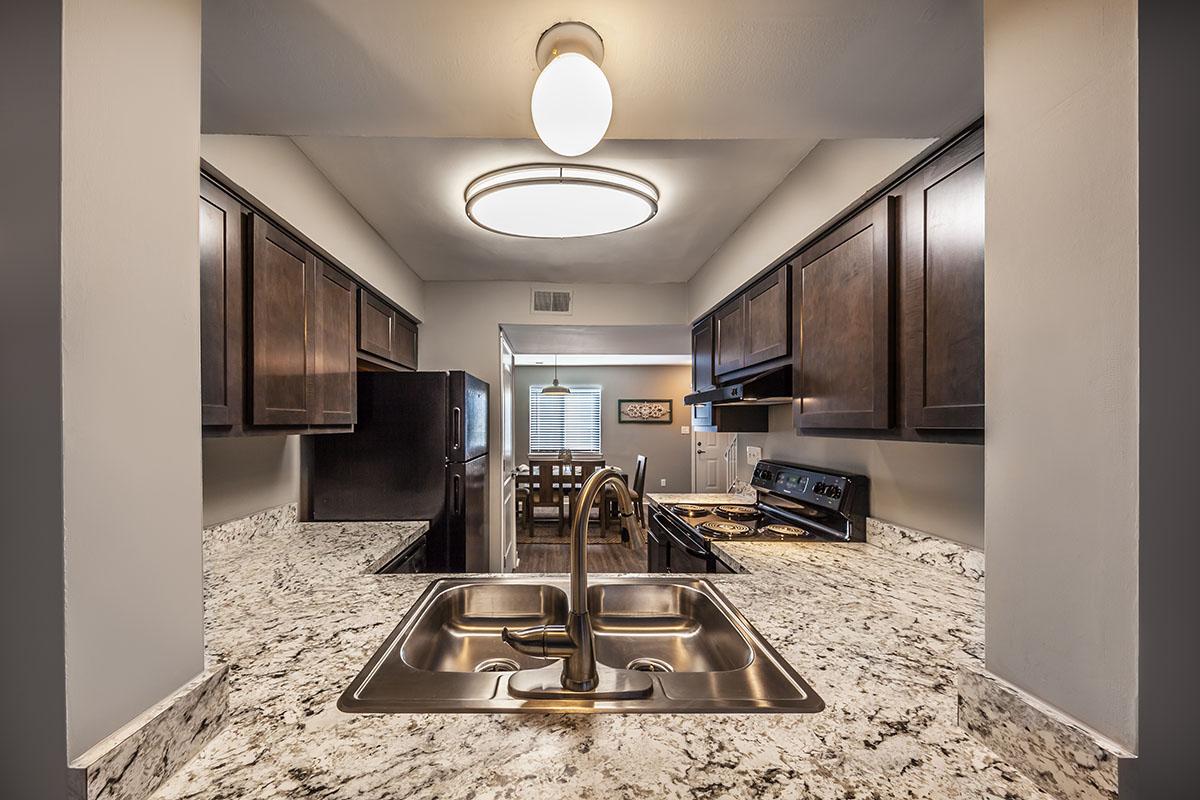 a modern kitchen with stainless steel appliances