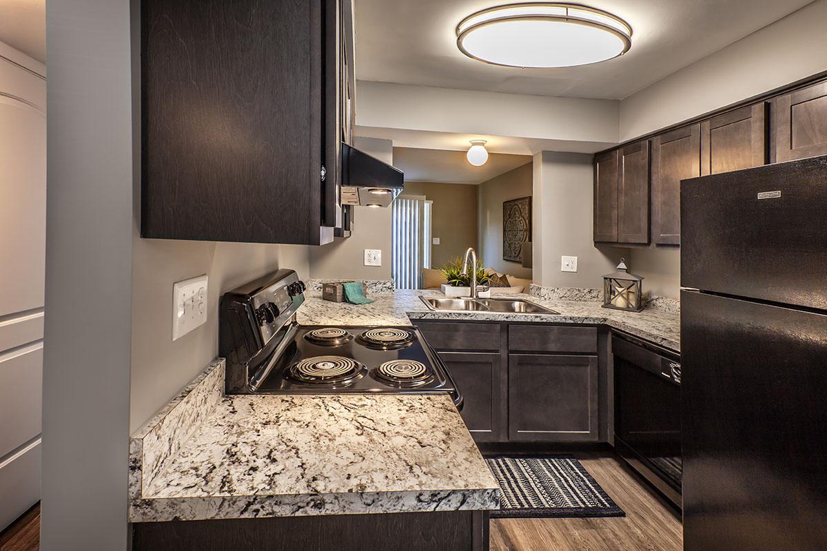 a modern kitchen with stainless steel appliances