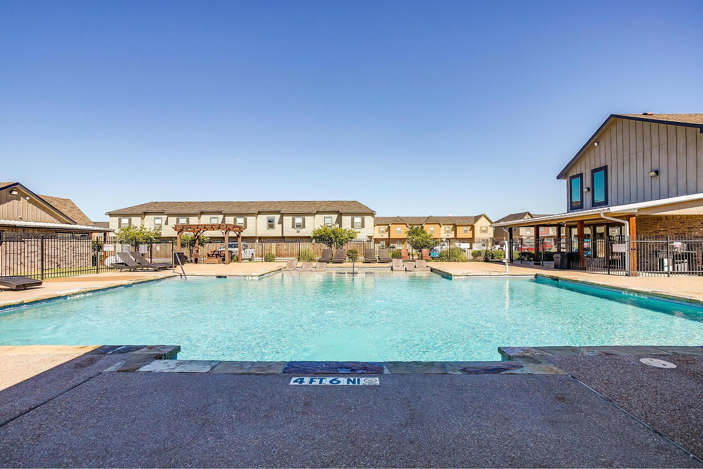 a pool next to a body of water