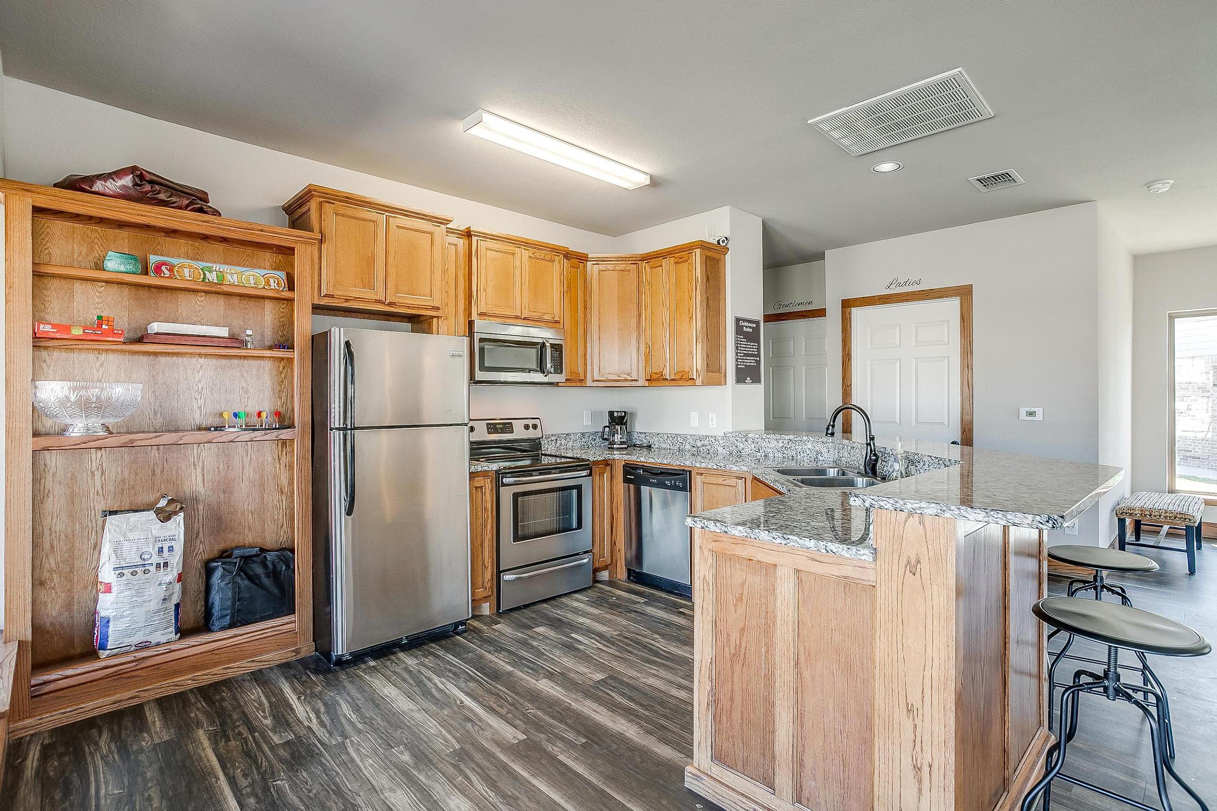 a room filled with furniture and wooden cabinets