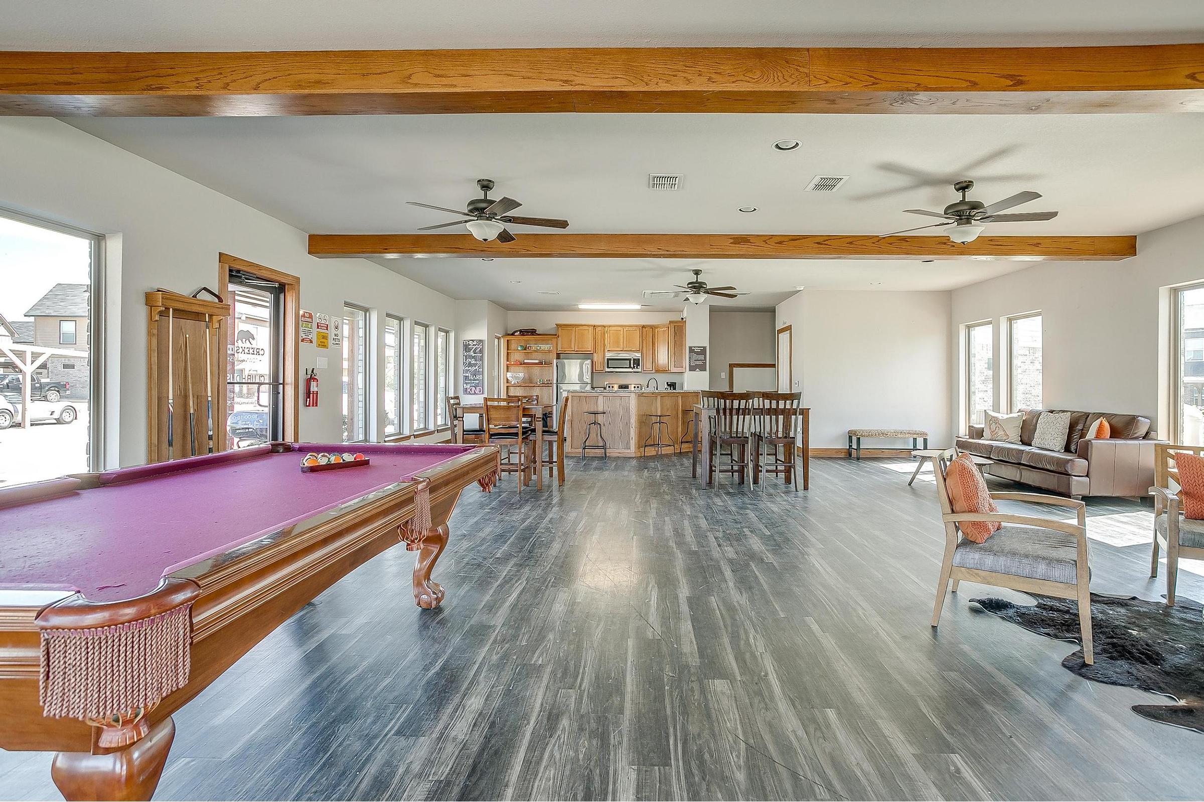 a room filled with furniture and a fire place