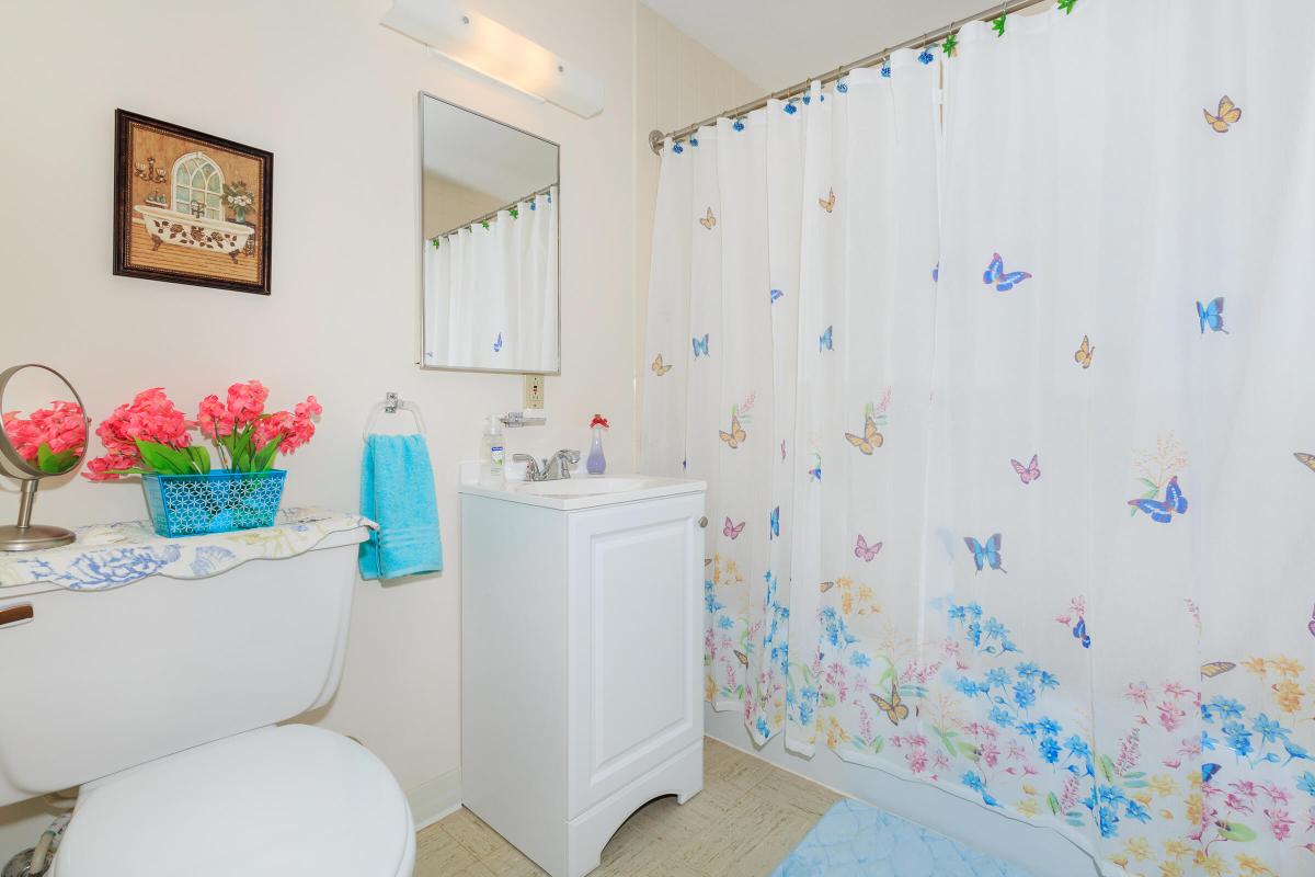 a bedroom with a shower curtain