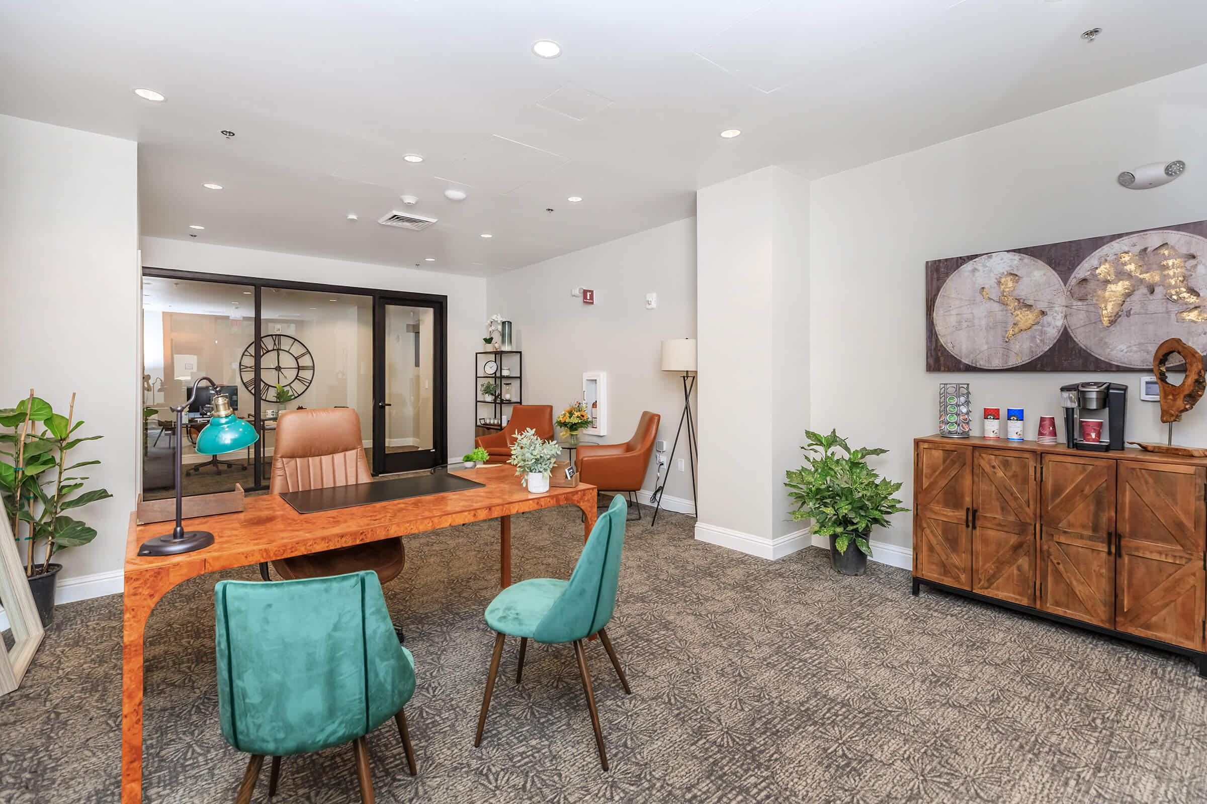 a living room filled with furniture and a rug