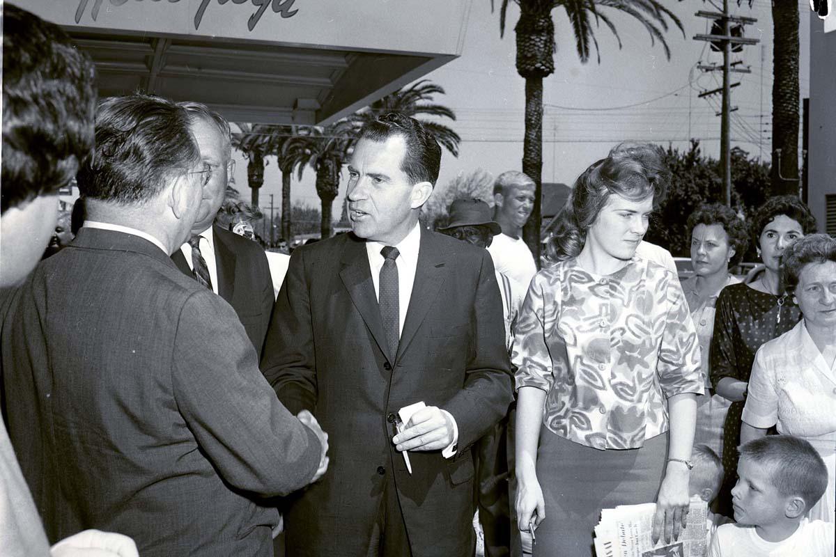 Richard Nixon et al. posing for the camera