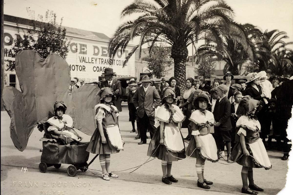 a group of people walking down the street