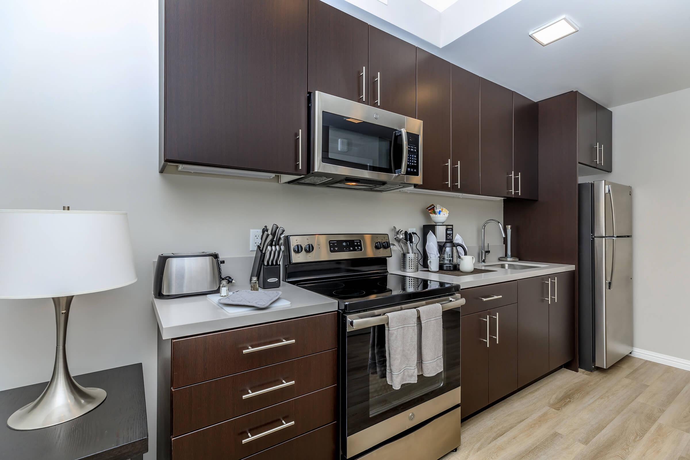 a kitchen with a table in a room