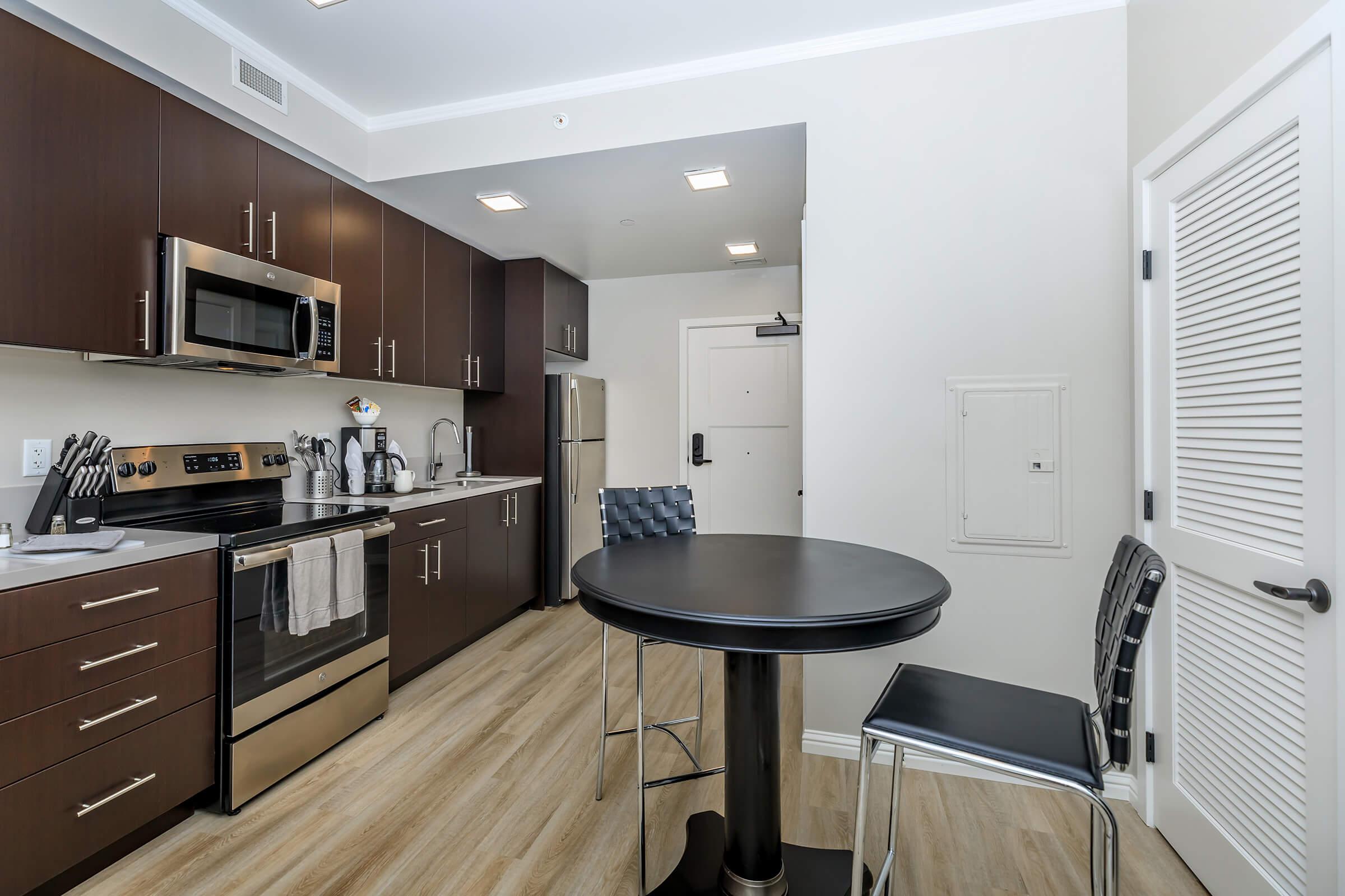 a kitchen with a sink and a window