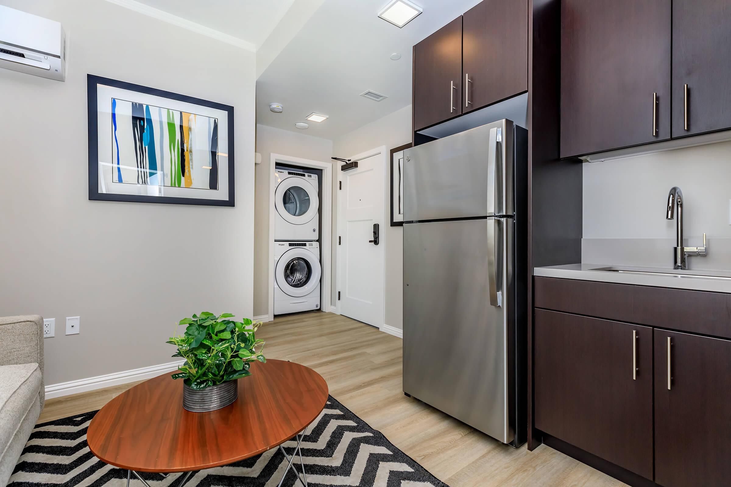 a modern kitchen with stainless steel appliances