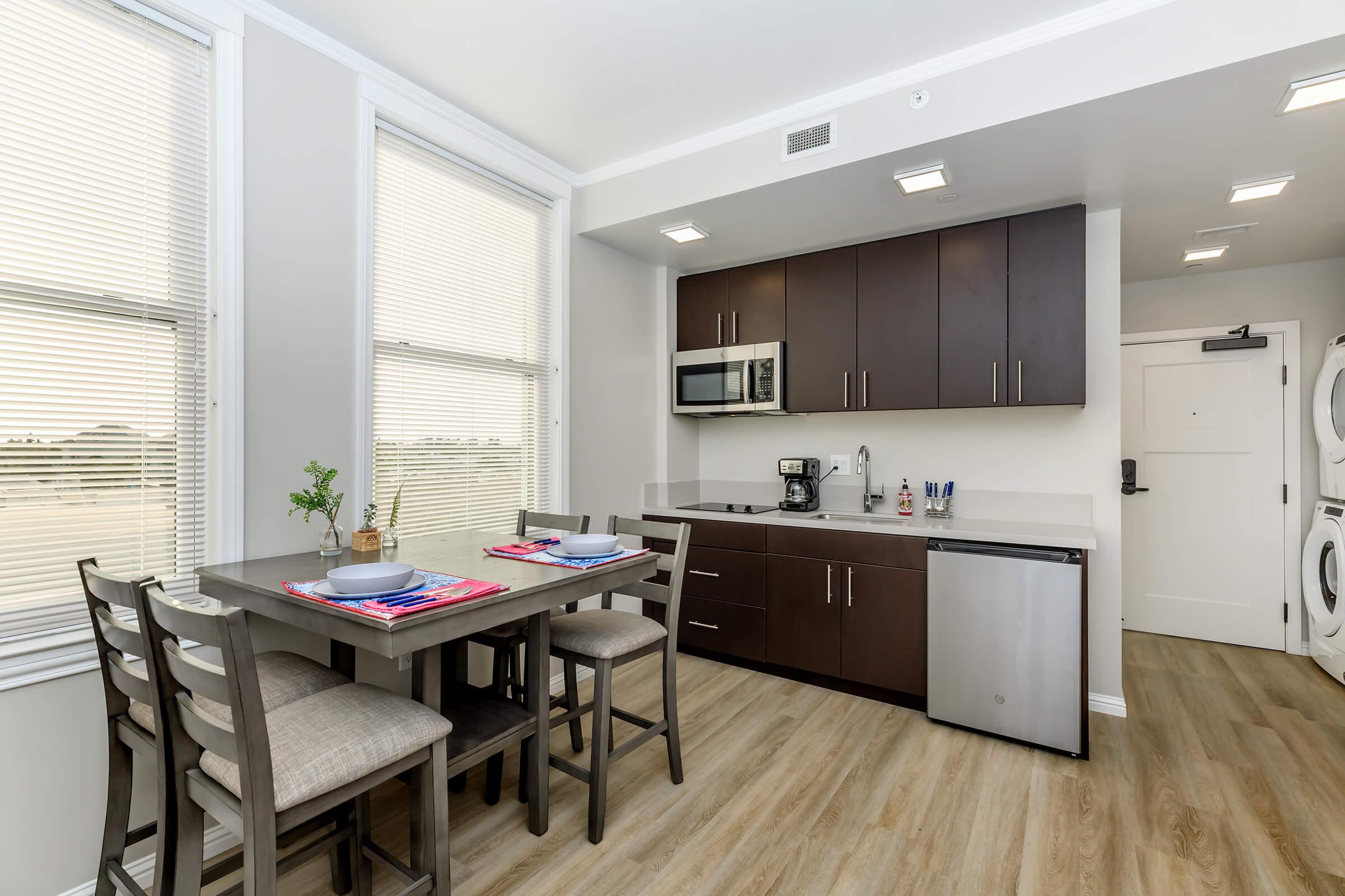 a kitchen with a large window