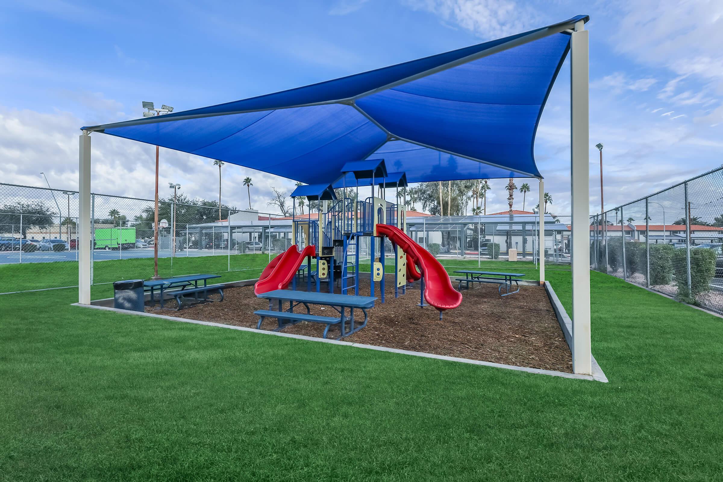 Children's playground with large sun covering