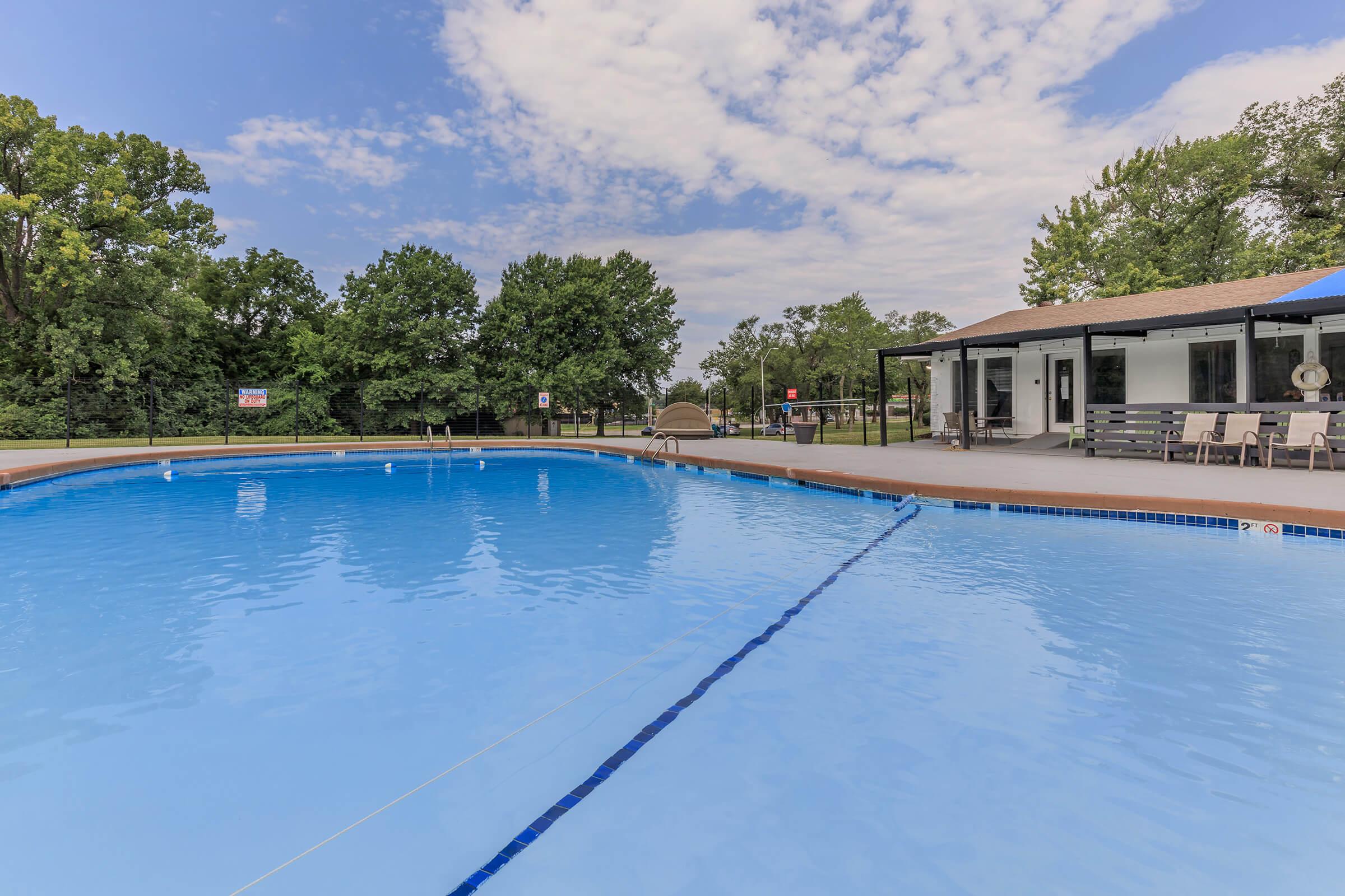 a pool next to a body of water