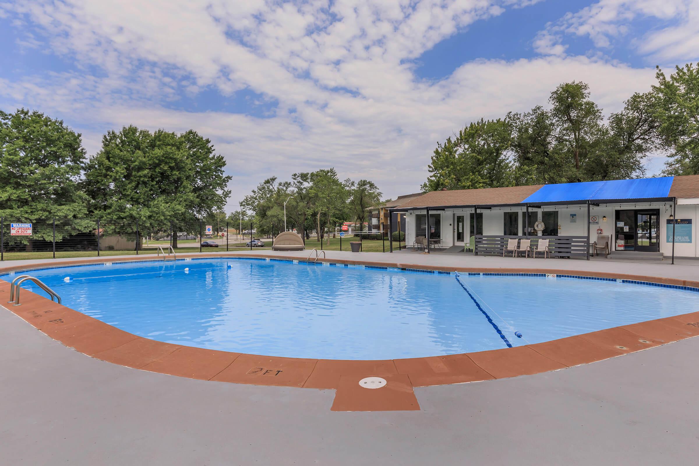 a pool next to a body of water