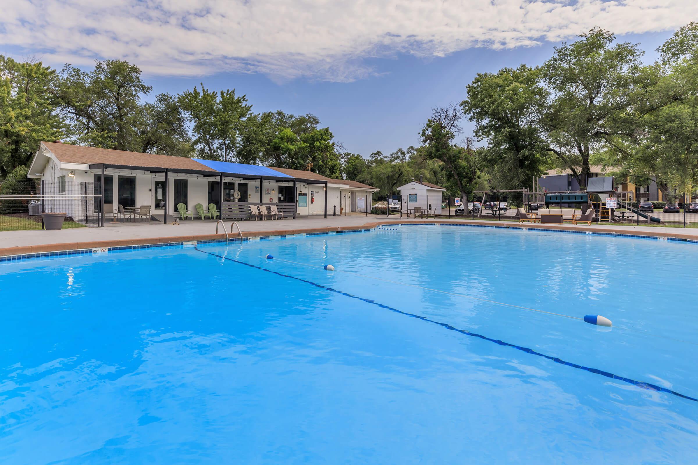 a pool next to a body of water