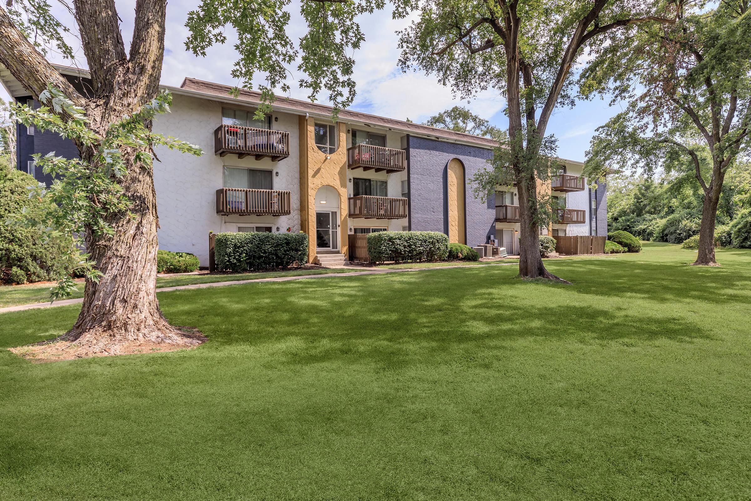 a large lawn in front of a house