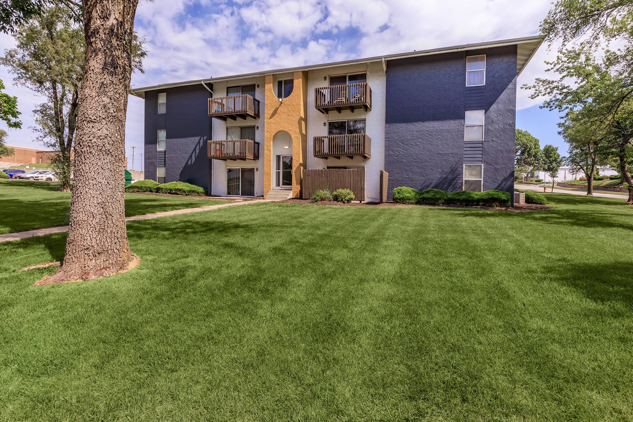 a large lawn in front of a house