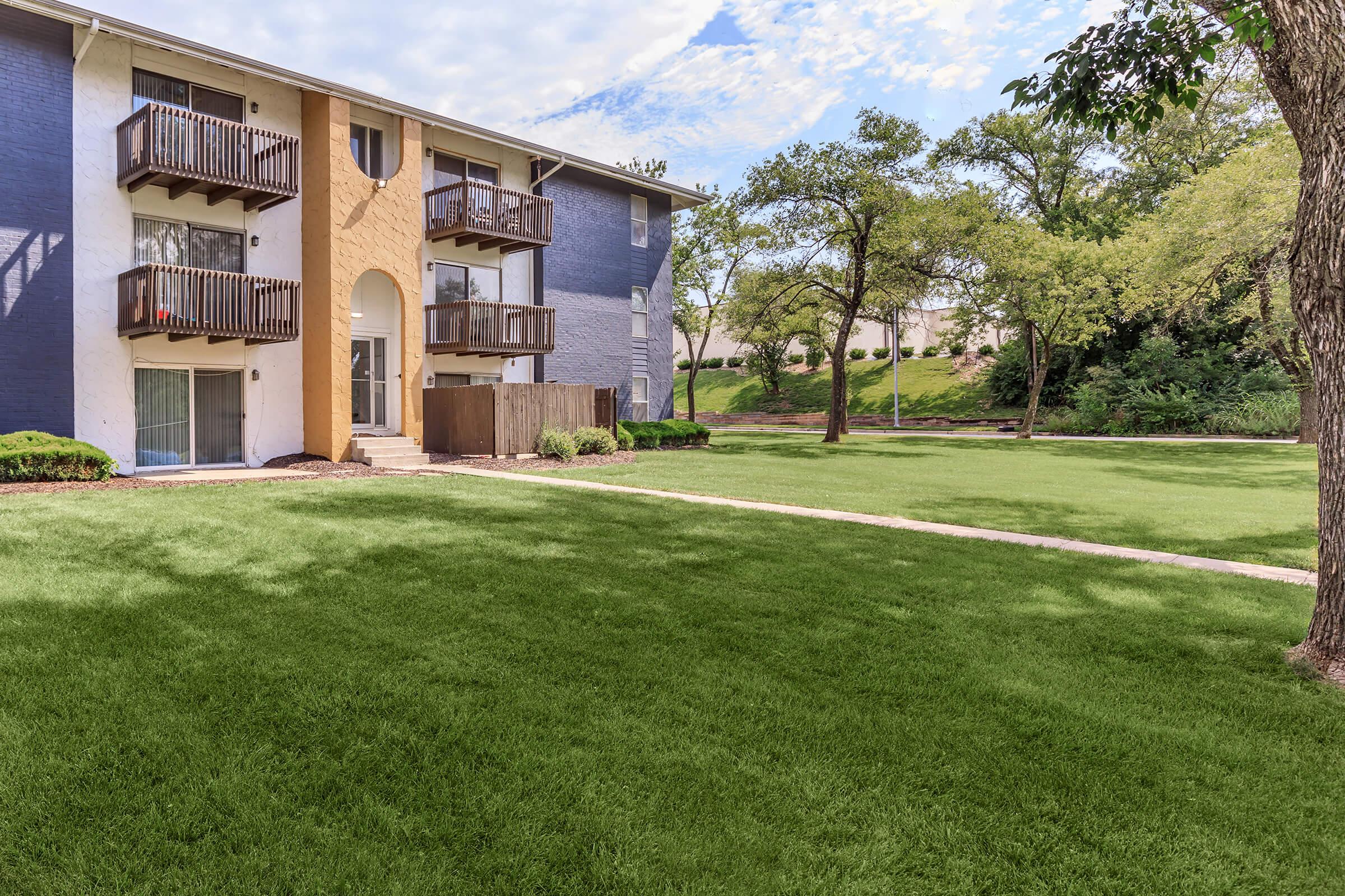 a large lawn in front of a house