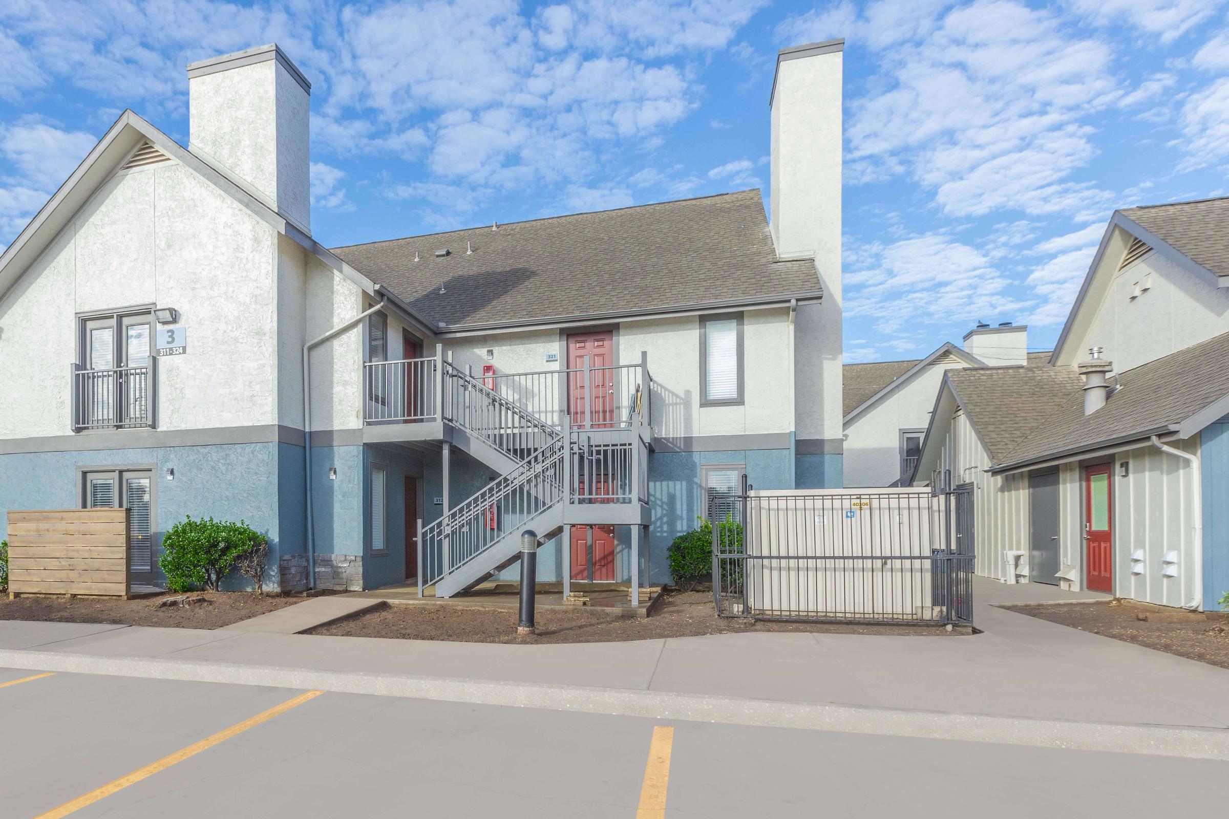 a close up of a street in front of a house