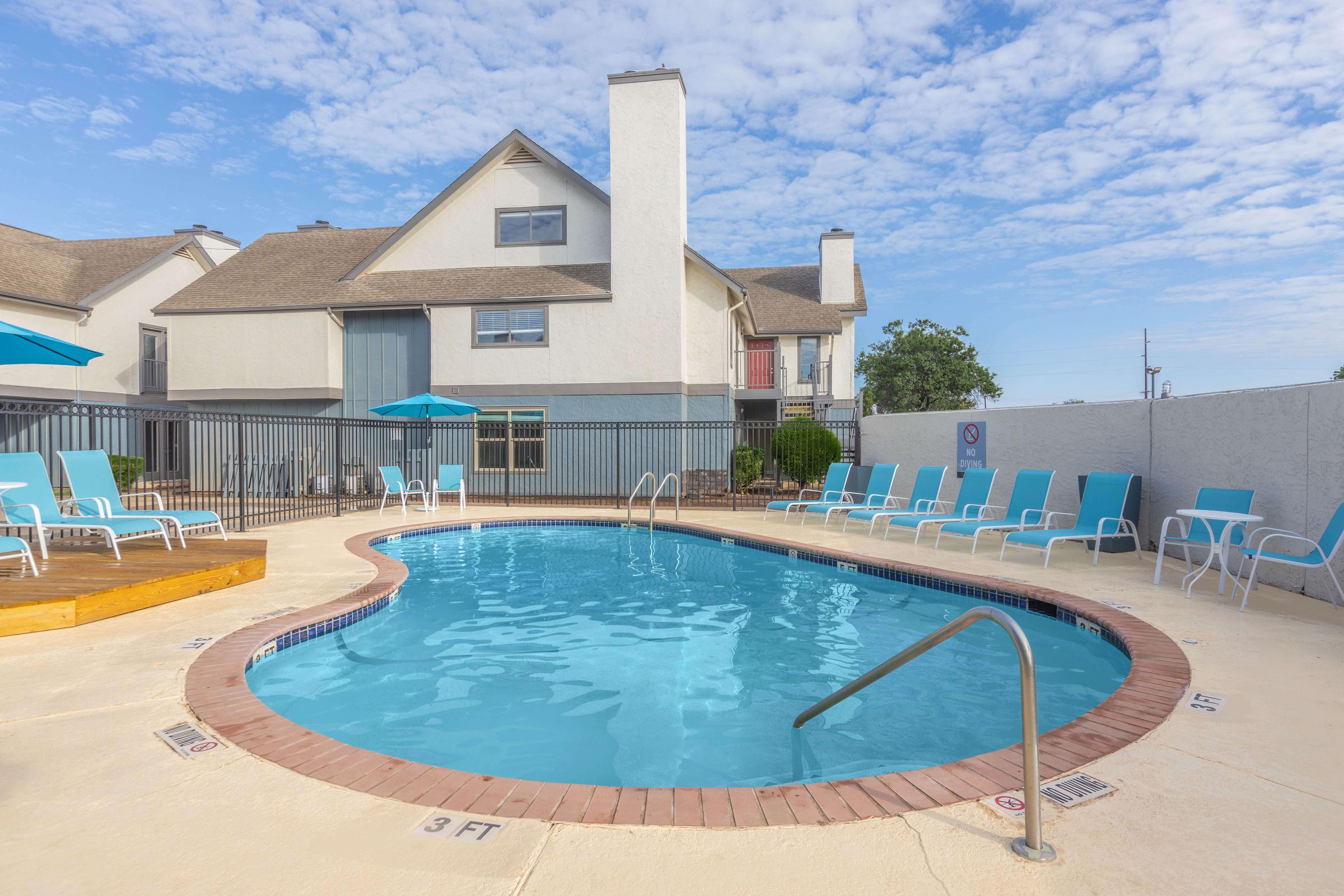 a house with a large pool of water