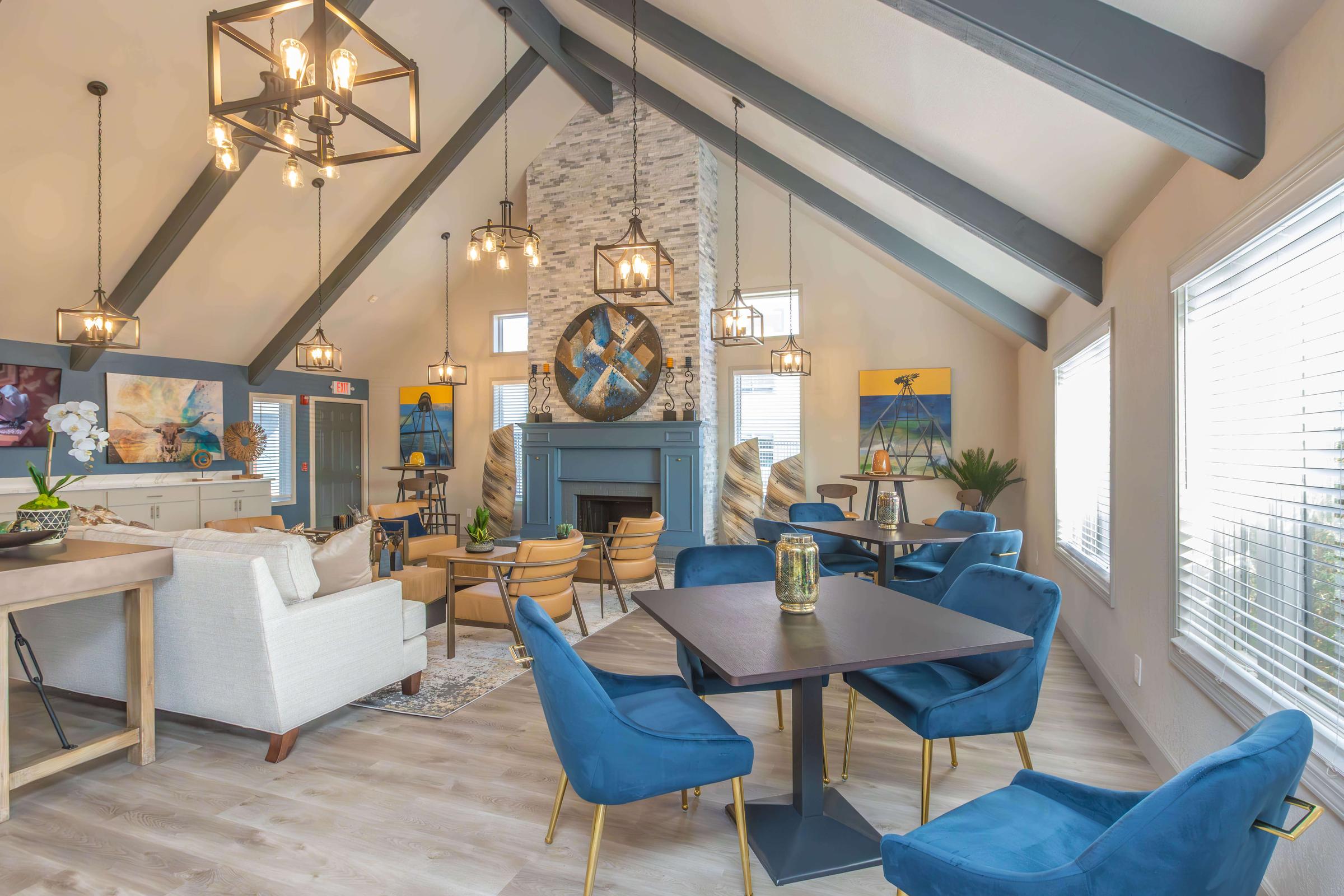 a living room filled with furniture and a large window